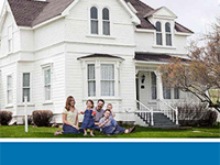 brochure cover, image of two-story house with porch